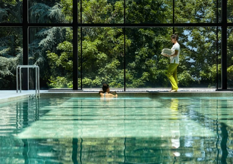 woman swimming pool six senses douro valley