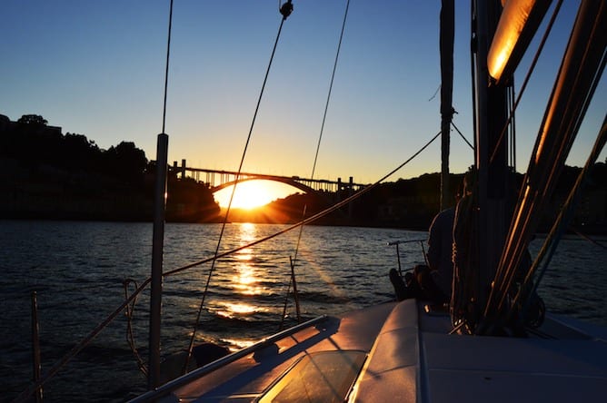 romantic sunset sailing boat porto arrabida bridge douro river