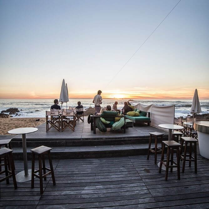outdoor seating sunset sea praia luz restaurant porto