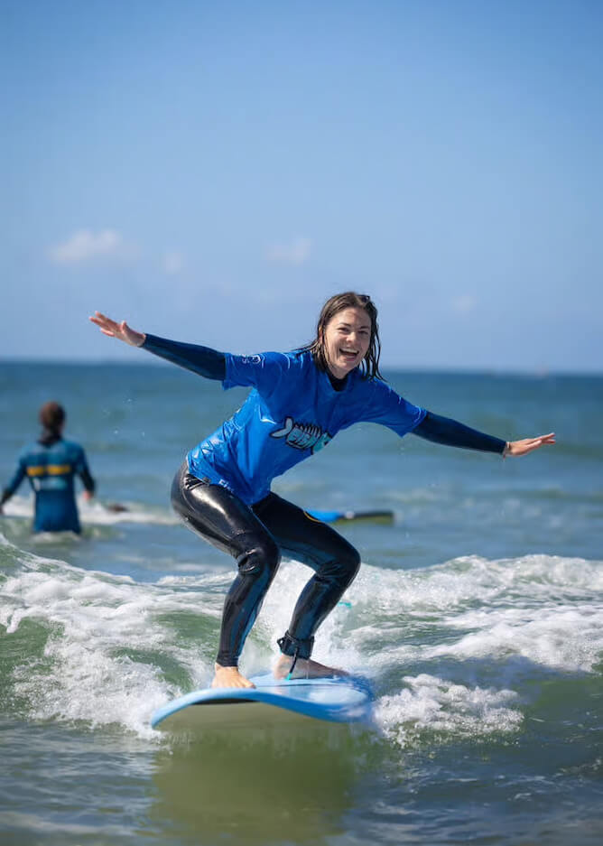 lady surfing waves